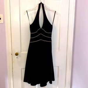 Black halter cocktail dress with tan piping